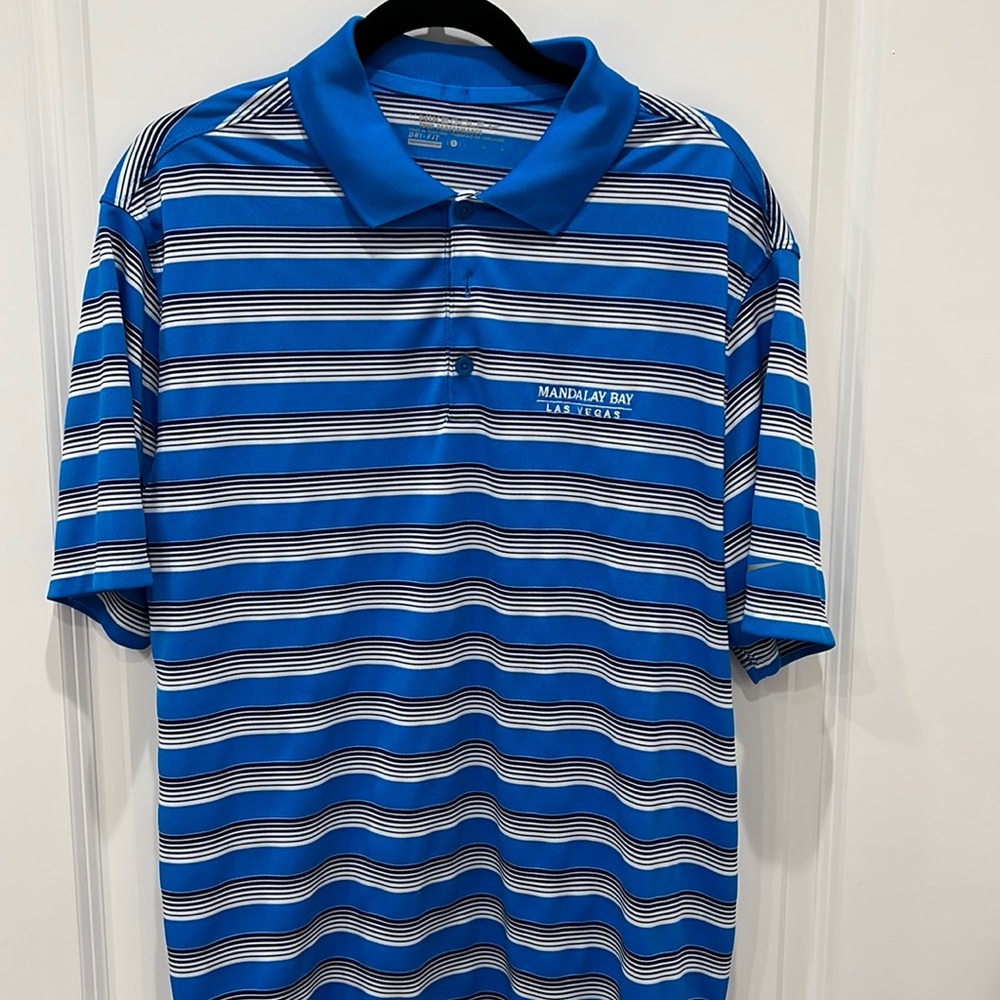 Nike Dri-Fit golf shirt. Wore one day to golf.